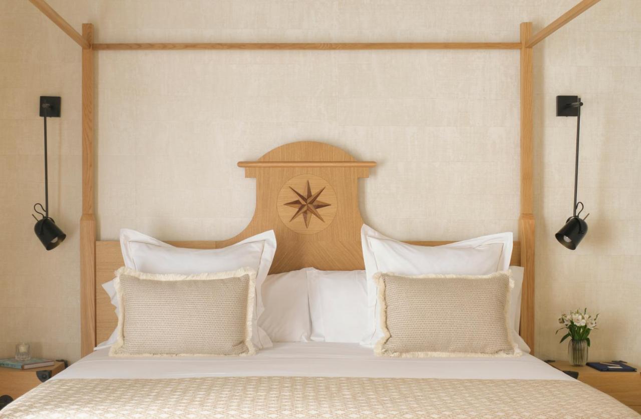 Hotel Antigua Palma - Casa Noble Bagian luar foto A bed with a star on the headboard