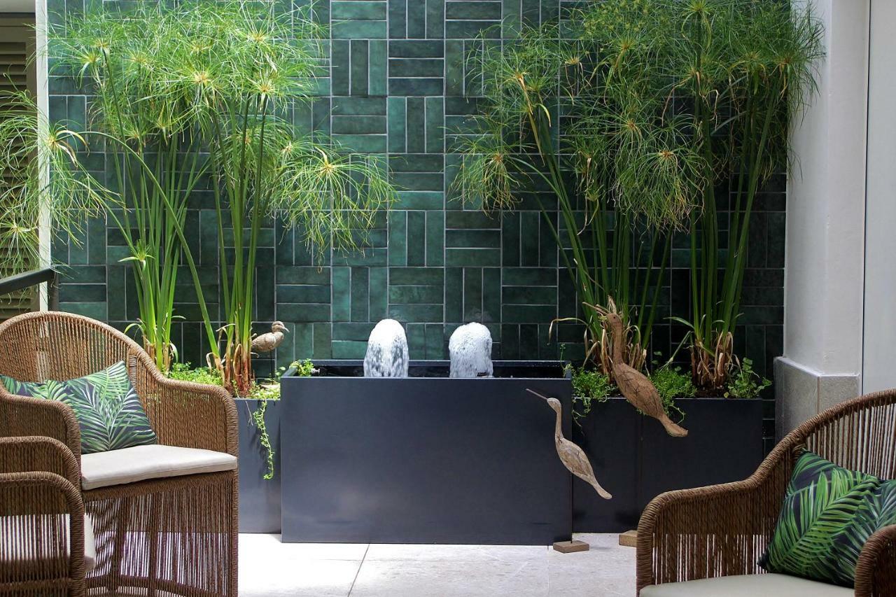 Hotel Antigua Palma - Casa Noble Bagian luar foto A contemporary Japanese-style soaking tub